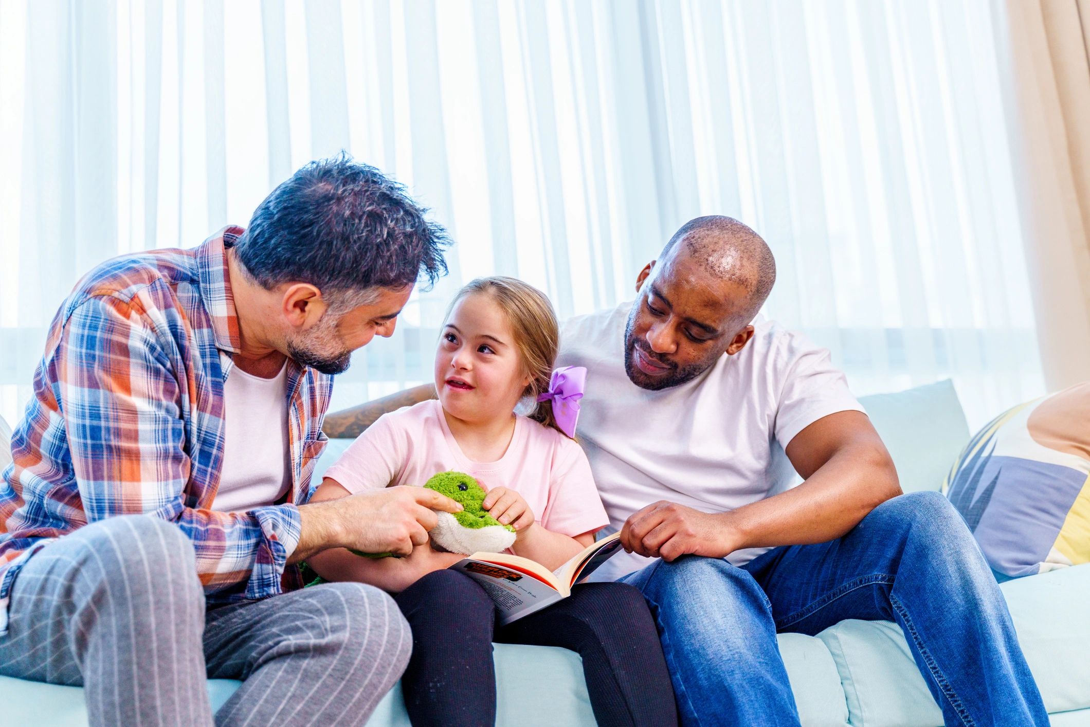 Family reading together at home