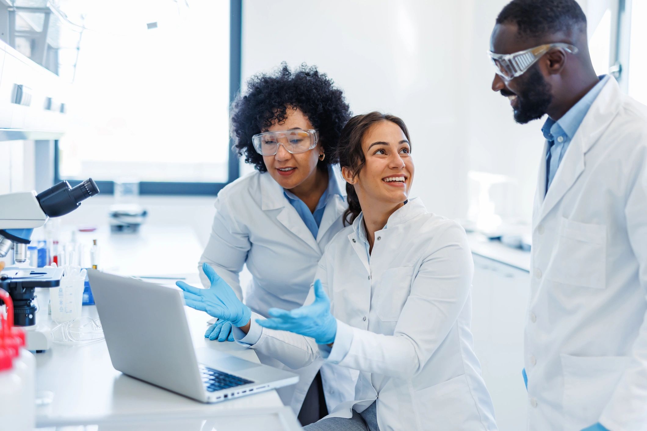 Researchers meeting in a laboratory