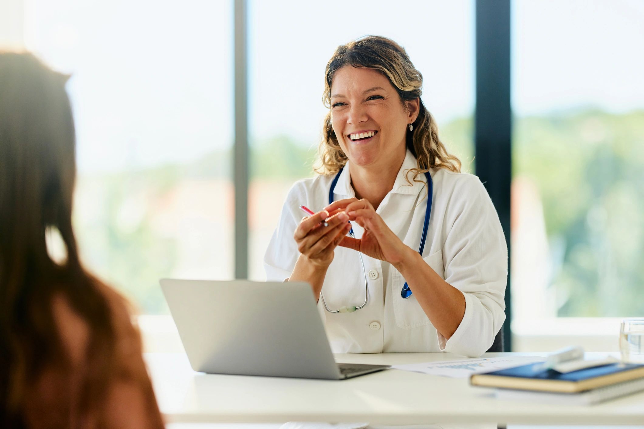Doctor speaking with a patient during a consultation